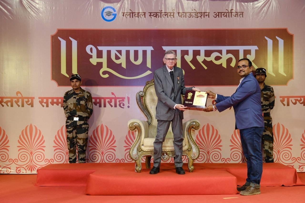 Dr. Pronab Haldar receiving the Bhushan Puraskar award